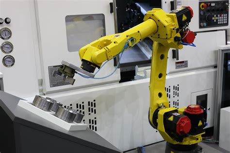 robotic cnc machine tending|ceiling mounted robotic arm.